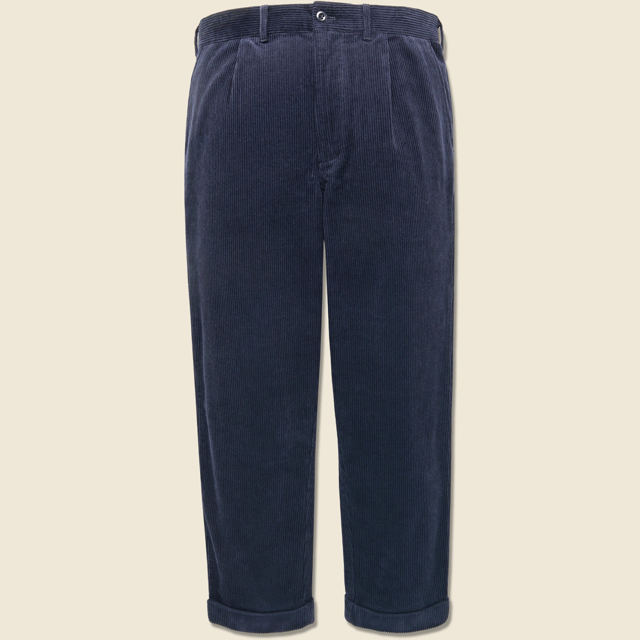 Corduroy Pleated Pant in Navy made from soft corduroy with a relaxed silhouette and classic front pleats.