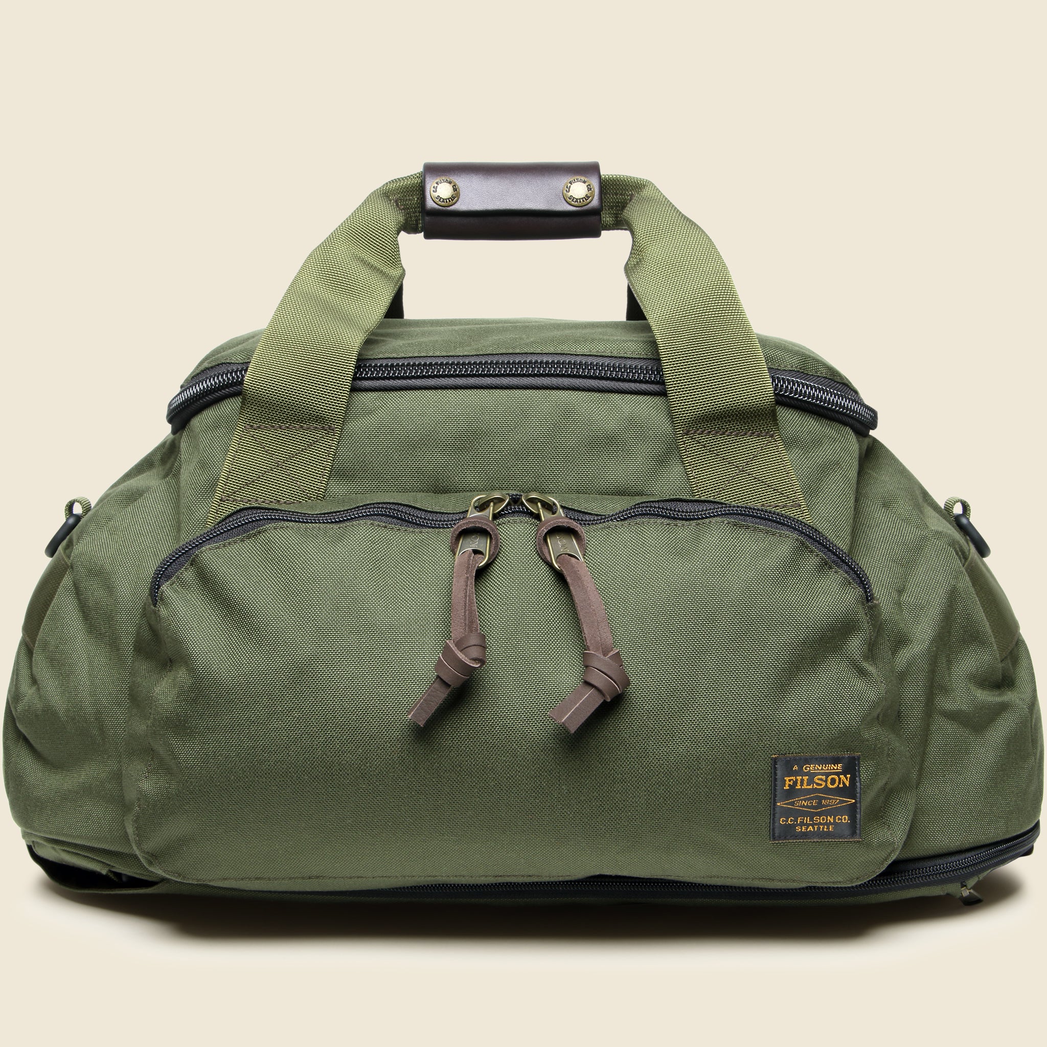 Filson Dryden Duffle Pack in Otter Green from STAG Provisions, versatile travel duffle backpack designed for weekend trips.
